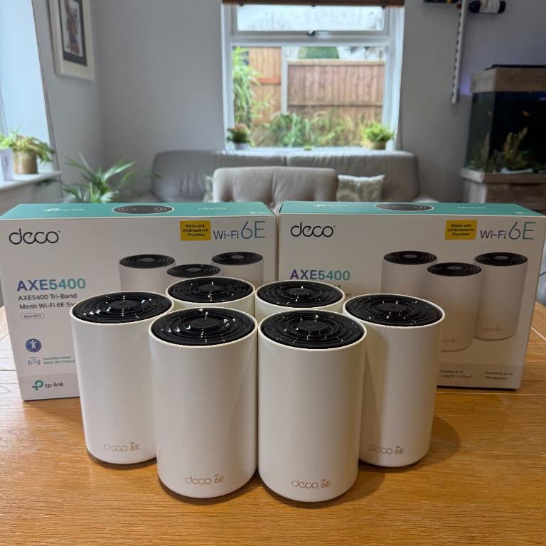 TP-Link Deco mesh WiFi units and packaging ready for a whole home installation