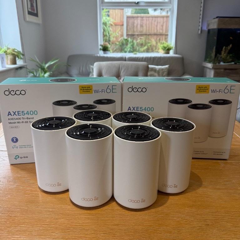TP-Link Deco AXE5400 mesh WiFi units and packaging ready for a home installation
