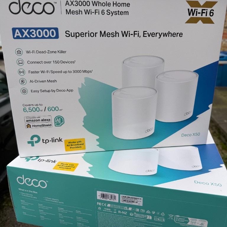 TP-Link Deco AX3000 mesh WiFi kit boxes prepared for a home installation
